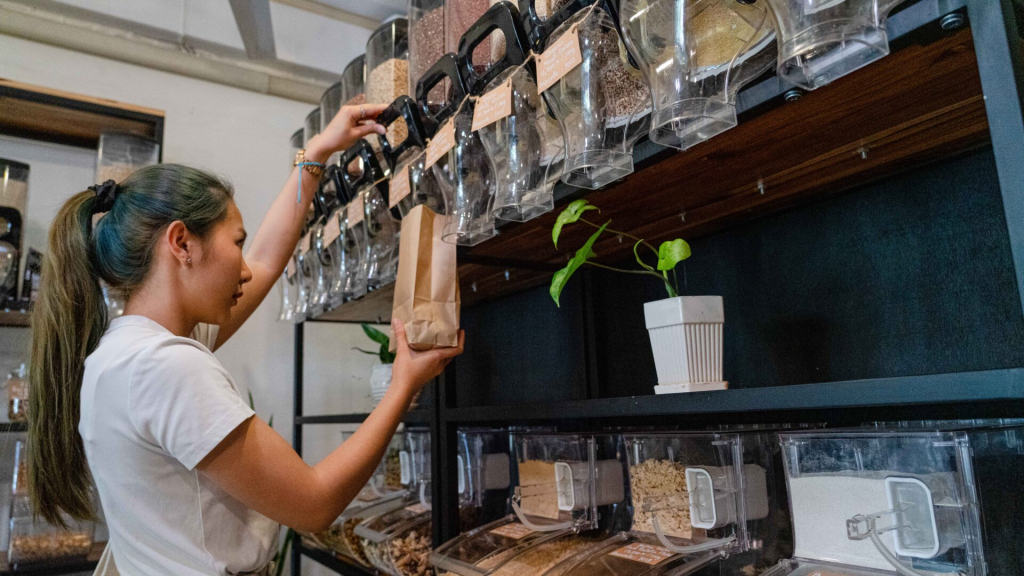 a women filling quinoa in a bag
